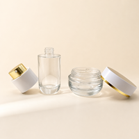Nuevo juego de cuidado de la piel con bomba rotativa de 100ml botella de esencia de loción de agua de vidrio 50g botella cosmética de crema facial