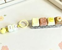 Mini clavier anti-stress portable avec breloque clavier, jouet sensoriel et pendentif clicker avec motif de dessin animé mignon, idéal comme cadeau pour étudiants