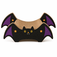 Lit pour chat incurvé en carton ondulé avec découpes en forme d'étoile, style aile de chauve-souris