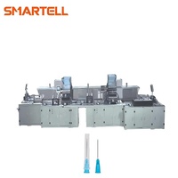 Machine de fabrication et d'assemblage d'aiguilles pour seringues hypodermiques à usage médical