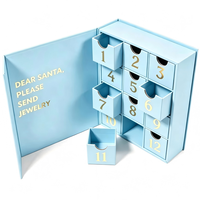 Babyblauer Schmuck-Adventskalender 12-Tage-Countdown-Geschenkbox mit Goldfolien-Zahlen in Buchform für Weihnachten und Feiertage