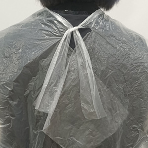 Capa de Peluquería Desechable de Plástico 90x130cm, Delantal de Salón para Tinte y Permanente del Cabello, 50 Hojas/Paquete, Hecho en China - Product Image 1