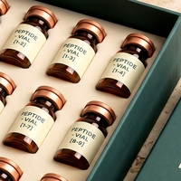 Boîte rigide personnalisée avec couvercle et base verts pour 12 flacons de peptides, logo estampé à chaud sur éponge