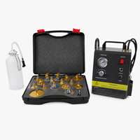 Machine professionnelle de purge et d'échange de liquide de frein électrique avec kit adaptateur pour maître-cylindre et bouteilles de récupération de liquide usagé