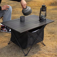 Table de pique-nique pliable légère MING CHAN pour l'extérieur avec une pochette en tissu pour le rangement, adaptée aux pique-niques et au camping.
