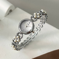 Montre élégante pour femme de style français, chaîne en métal à maillons perlés, cadran en nacre, montre-bracelet à quartz de luxe résistante à l'eau