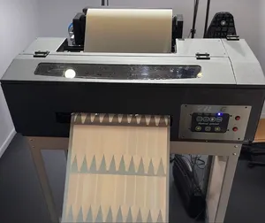 Penjualan paling laris pencetak dtf A3 Drucker Disenos L1800 Roll PET Film DIY T-Shirt tekstil mesin cetak