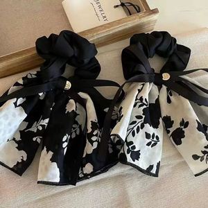 Élastiques à cheveux élégants avec nœuds et fleurs en ruban, style européen et américain, pour femmes, vente en gros - Product Image 3