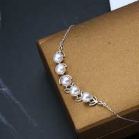 Collier ras du cou tendance en or massif 14 carats avec perle naturelle d'eau de mer et feuille de branche d'olivier creuse, chaîne à maillons