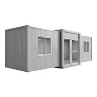 Maison conteneur extensible de 20 pieds à double aile, préfabriquée, modulaire, gris industriel, pour bureau, dortoir ou usage sur chantier