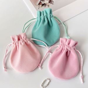 ถุงกำมะหยี่สีชมพูพิมพ์โลโก้ตามสั่ง ถุงผ้ารูปทรงน้ำเต้าแบบมีเชือกผูก สำหรับใส่แหวน ต่างหู สร้อยคอ บรรจุภัณฑ์ของขวัญ ถุงเก็บของ - Product Image 5