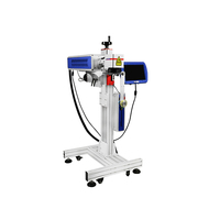Autofocus en ligne volant 30W co2 galvo laser machine de marquage avec convoyeur pour jeans carte d'identité câble oiseau anneau stylo gravure sur bois