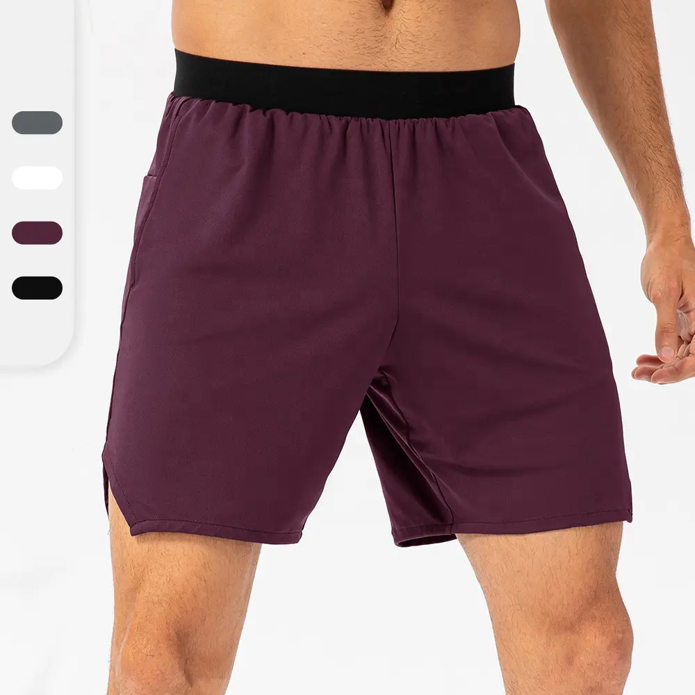 Pantalones cortos ajustados con bolsillos laterales para hombre, Shorts deportivos elásticos para correr, gimnasio, Fitness, absorción de humedad y absorción