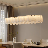 Suspension linéaire contemporaine en acier brossé et albâtre, luminaire de luxe pour salon et salle à manger, lustre en marbre