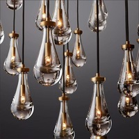 Lustre créatif à tête unique en forme de goutte d'eau, avec redresseur à semi-conducteurs, en fer doré et verre, de luxe, pour escalier et comptoir de bar
