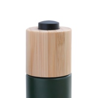 Flacon compte-gouttes en verre avec bouton-poussoir en bambou personnalisé de luxe avec couvercle en bambou pour l'emballage d'huiles essentielles, de sérums et de cosmétiques