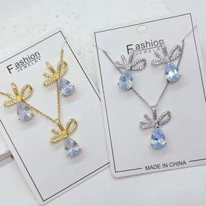 Conjunto de joyas de acero inoxidable brillante para mujer, collar con colgante de lágrima de circón chapado en oro de 18 quilates y pendientes, conjunto de regalo - Product Image 1