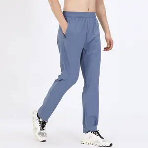 Toptan spor kıyafetleri gevşek Sweatpants erkekler rahat ince tarzı koşu pantolonları iş pantolon