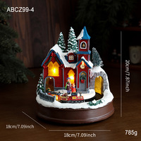 Maison de Noël en résine colorée avec train rotatif, lumières illuminées, boîte à musique, décorations de Noël pour bureau