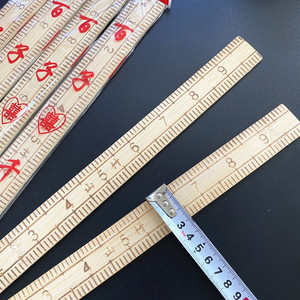 Regla de bambú, regla de tela, regla china, regla para medir ropa, fuente mayorista para tiendas de un y dos yuanes. - Product Image 3