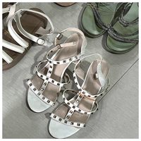 GZ Usine de Chine Offres Spéciales Chaussures de qualité Ballots usagés Pantoufles et sandales d'occasion pour femmes Sandales d'occasion pour femmes