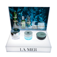 Présentoir cosmétique LED en acrylique de luxe moderne de haute qualité, personnalisable en couleur, 5 étagères pour huiles essentielles et parfums