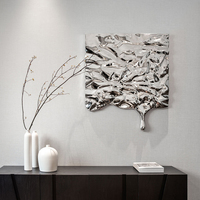Sculpture murale décorative moderne de luxe en acier inoxydable 3D faite à la main avec un design abstrait d'eau pour la décoration intérieure
