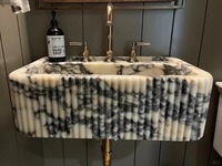 Lavabo mural cannelé en marbre Calacatta Viola naturel, finition polie, pour hôtel, décoration de salle de bain en marbre