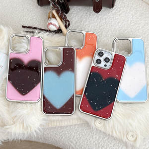 Funda para iPhone 17 Pro Max, diseño de corazón extragrande con borde plateado, resina con orificios grandes, anticaídas - Product Image 1