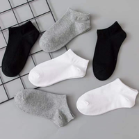 Chaussettes jetables bon marché en vrac Chaussettes en coton doux sans couture à usage unique Chaussettes à essayer directement en gros à l'usine