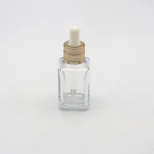 Cosmetic packaging 30ml transparent glass bottle of liquid oil with square dropper