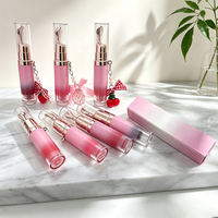 Huile repulpante hydratante OEM en gros avec applicateur métallique rafraîchissant, saveur fruitée, huile magique pour les lèvres, maquillage végétalien, gloss teinté