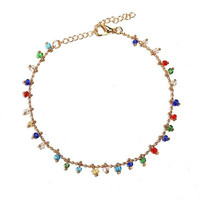 Chaîne de cheville Bowei faite à la main avec perles de riz colorées et pendentif pompon, ornement de pied en chaîne dorée
