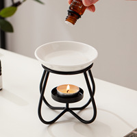 Brûleur d'aromathérapie créatif en céramique noir et blanc à quatre pétales, lampe à huile essentielle, bougie domestique, stock de cire