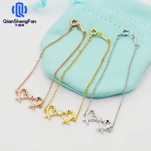 Collar <span class=keywords><strong>de</strong></span> Acero Inoxidable con Letra T <span class=keywords><strong>de</strong></span> Bambú y Corazón Cruzado con Diamante Único para Mujer, Collar Doble <span class=keywords><strong>de</strong></span> Corazón <span class=keywords><strong>de</strong></span> Durazno Chapado <span class=keywords><strong>en</strong></span> Oro Estilo Deportivo - Product Image 1