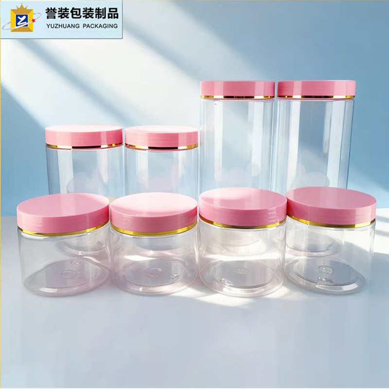 Transparent 68mm bottle with pink lid with golden line