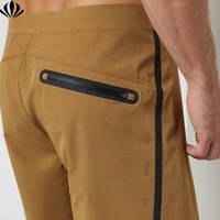Shorts de plage et de surf pour hommes avec logo personnalisé, tissu extensible à séchage rapide, poche zippée