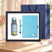 Ensemble cadeau d'entreprise avec parapluie promotionnel, carnet de notes et stylo personnalisés avec logo, produits innovants