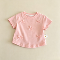 T-shirt OEM personnalisé pour filles, à manches courtes, orné d'un nœud, en tissu fin, col rond, pour l'été, le printemps, l'école, le quotidien et les sorties