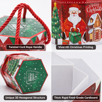 Boîte cadeau hexagonale en carton avec poignée en corde torsadée pour bonbons et pommes de Noël, motif bonhomme de neige mignon