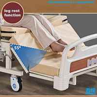Lit de soins multifonctionnel manuel Songzi avec dossier inclinable gauche-droite, levage des jambes, trou pour toilettes et table à manger
