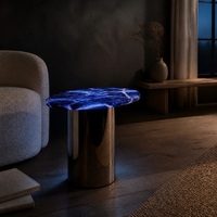 Table d'appoint ovale en marbre rétroéclairé avec base en acier miroir