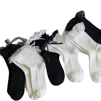 Chaussettes en coton blanc et noir pour femmes avec volants en dentelle, détail de nœud tendance, tricotées, séchage rapide, respirantes, usage quotidien, vente en gros