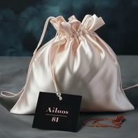 Luxe haute qualité cheveux soie cordon sacs Satin perruque cheveux sacs-cadeaux pochettes pour la fête d'anniversaire de faveur de mariage
