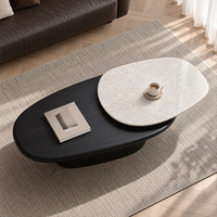 Table basse rotative de luxe contemporaine et durable pour la maison, forme irrégulière, plateau en marbre blanc, structure en bois massif noir, pour salon