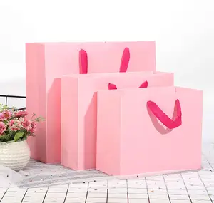 Groothandel Hoge Kwaliteit Grote Papieren Zak Verpakking Heldere Roze Voor Winkelen Baby Kleding Bruiloften Kerstvieringen Gift