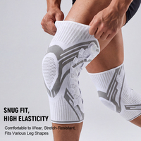 KS-2380 # Genouillère de compression tricotée avec système de réglage rotatif, stabilisateurs latéraux et ressorts en silicone pour le sport