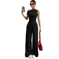 Ensemble deux pièces tendance pour femme : débardeur uni sans manches et pantalon long en polyester et élasthanne – Idéal pour club ou tenue décontractée sexy