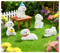 Vente en gros de figurines de dessins animés mini jouets pour enfants sculpture d'animaux art résine sable été chien endormi livre de lecture planche de surf chaise à bière