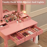 Coiffeuse rose avec miroir LED triple pliable et chaise réglable, idéale pour chambre de fille
